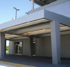 aluminum pedestrian drop off on side of building
