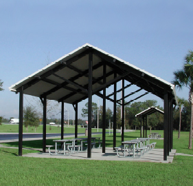 pitched aluminum pavilion in a field