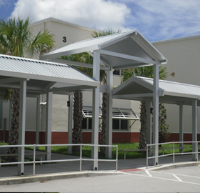 tall aluminum pitched roof with pitched cover systems on both sides